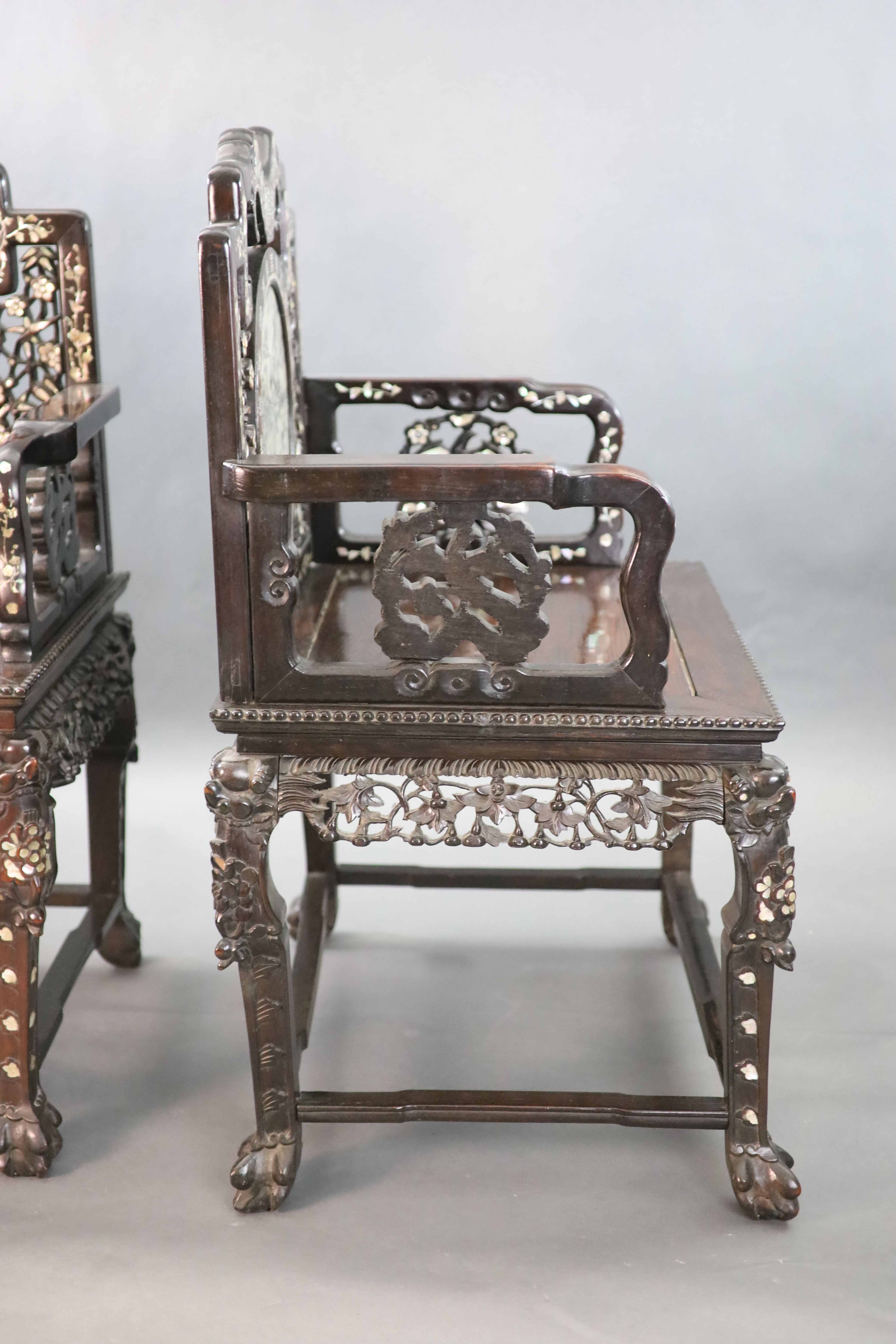 An impressive pair of Chinese hongmu and mother of pearl inlaid throne armchairs, c.1910, 70cm wide, 103cm high, Provenance - A. T. Arb